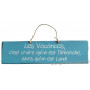 Plaque en bois " Les Vacances c'est croire qu'on est dimanche alors qu'on est lundi " fond bleu ciel